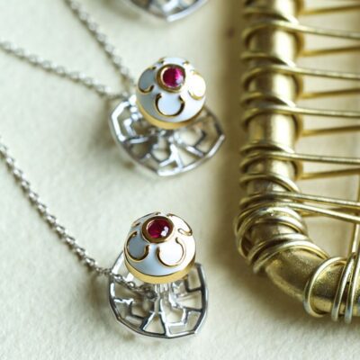 Amyn White Enamel Ruby Buttons